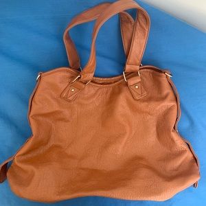 Large brown leather handbag